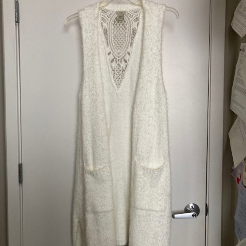 Winter white furry long vest with pockets and lace-looking back yoke